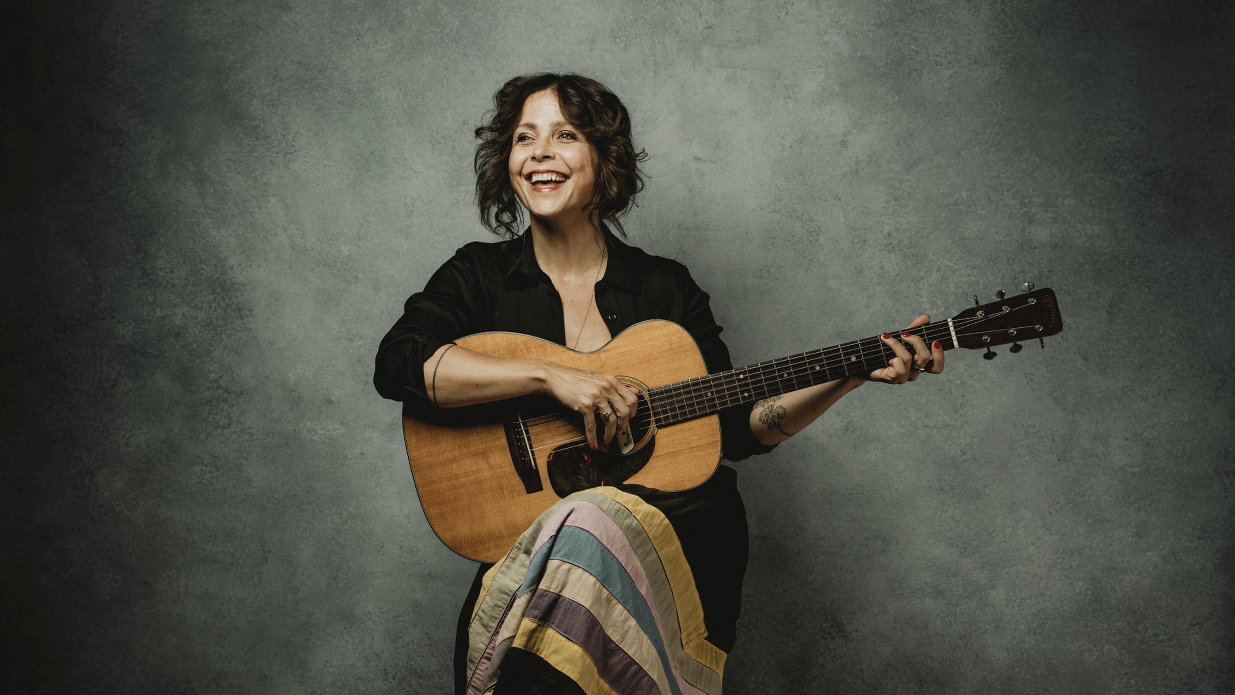 May Erlewine and Packy Lundholm with R.O. Shapiro